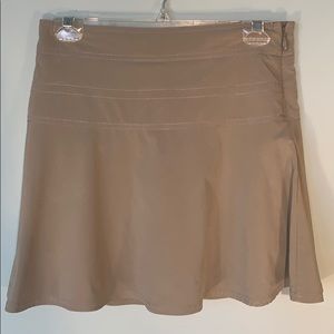 Always in demand tan Athleta Skort. Size 2